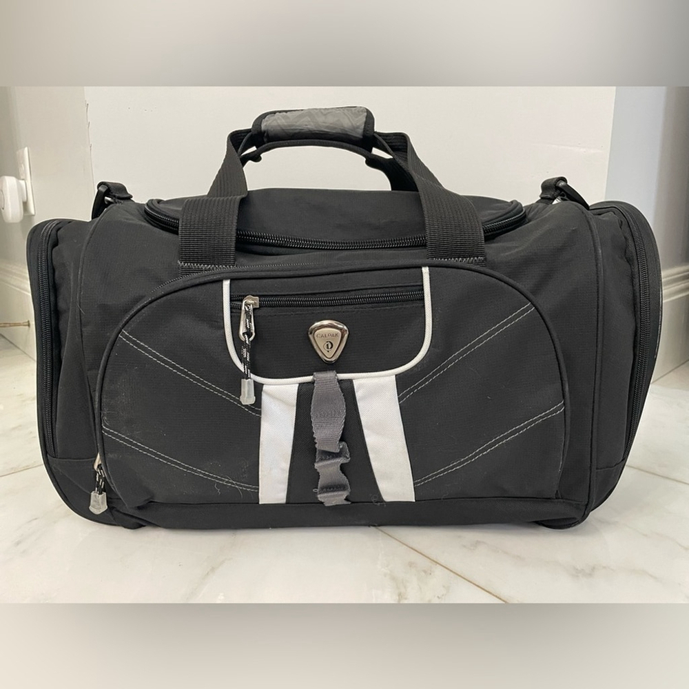 Calpak black canvas multi-pocket dual strap duffel bag travel luggage gym